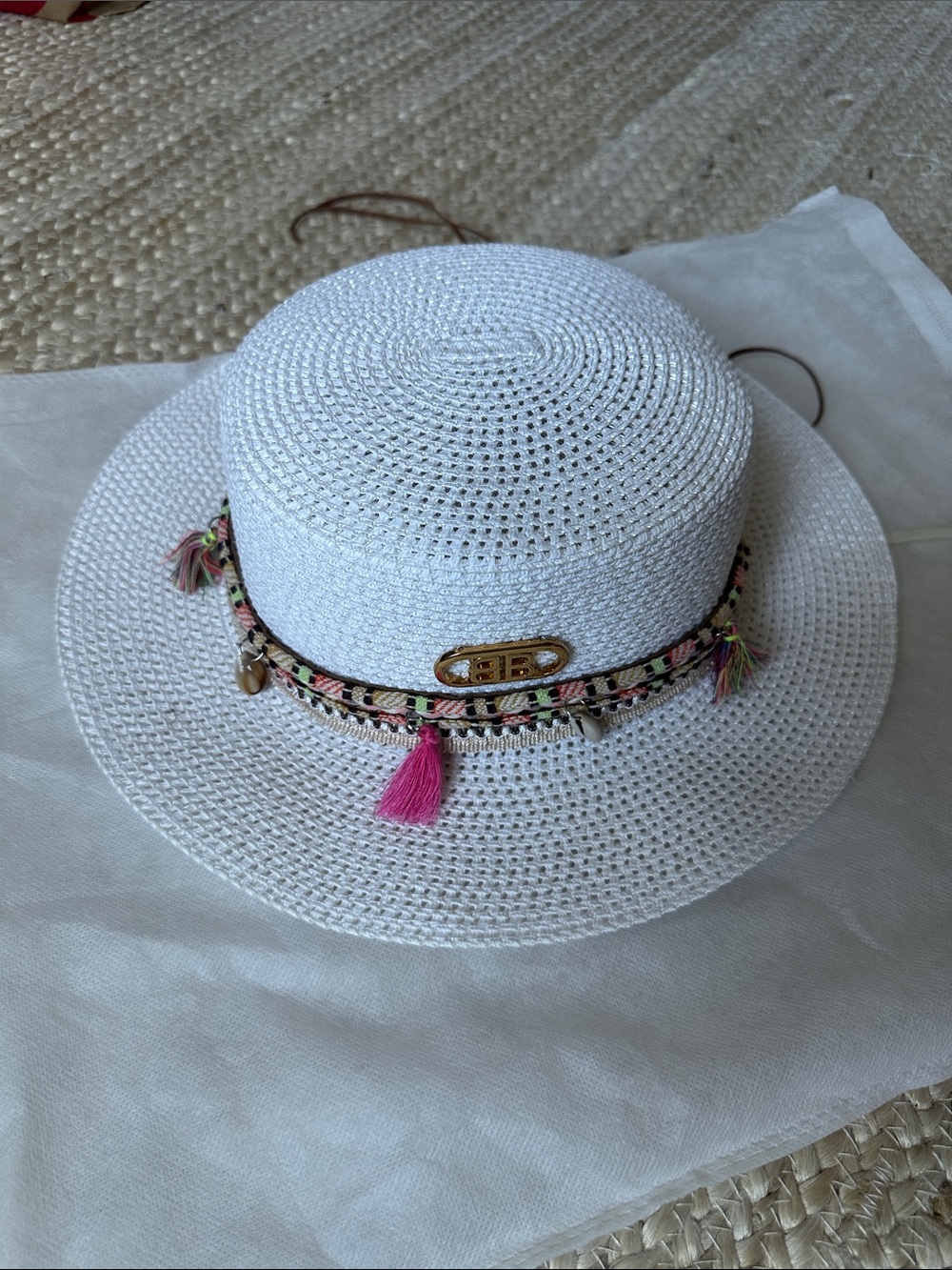 White Straw Sun Hat with Pink Tassel Trim